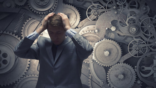 Anzugtraeger-depressiv-Zahnraeder-74835748-FO-Sergey-Nivens