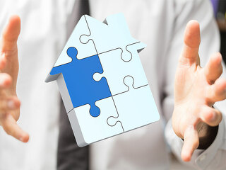 Anzugtraeger-Haende-Puzzle-Haus-76663506-FO-vege