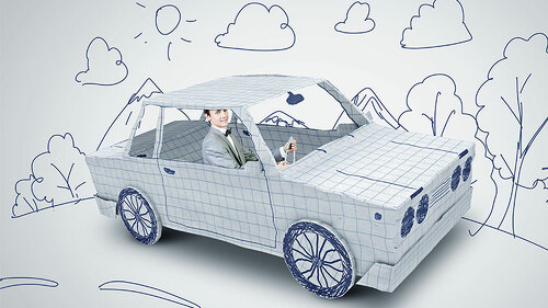 Anzugtraeger-in-Papierauto-66204539-FO-Sergey-Nivens