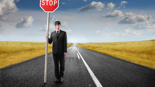 Anzugtraeger-Stoppschild-26309983-FO-olly